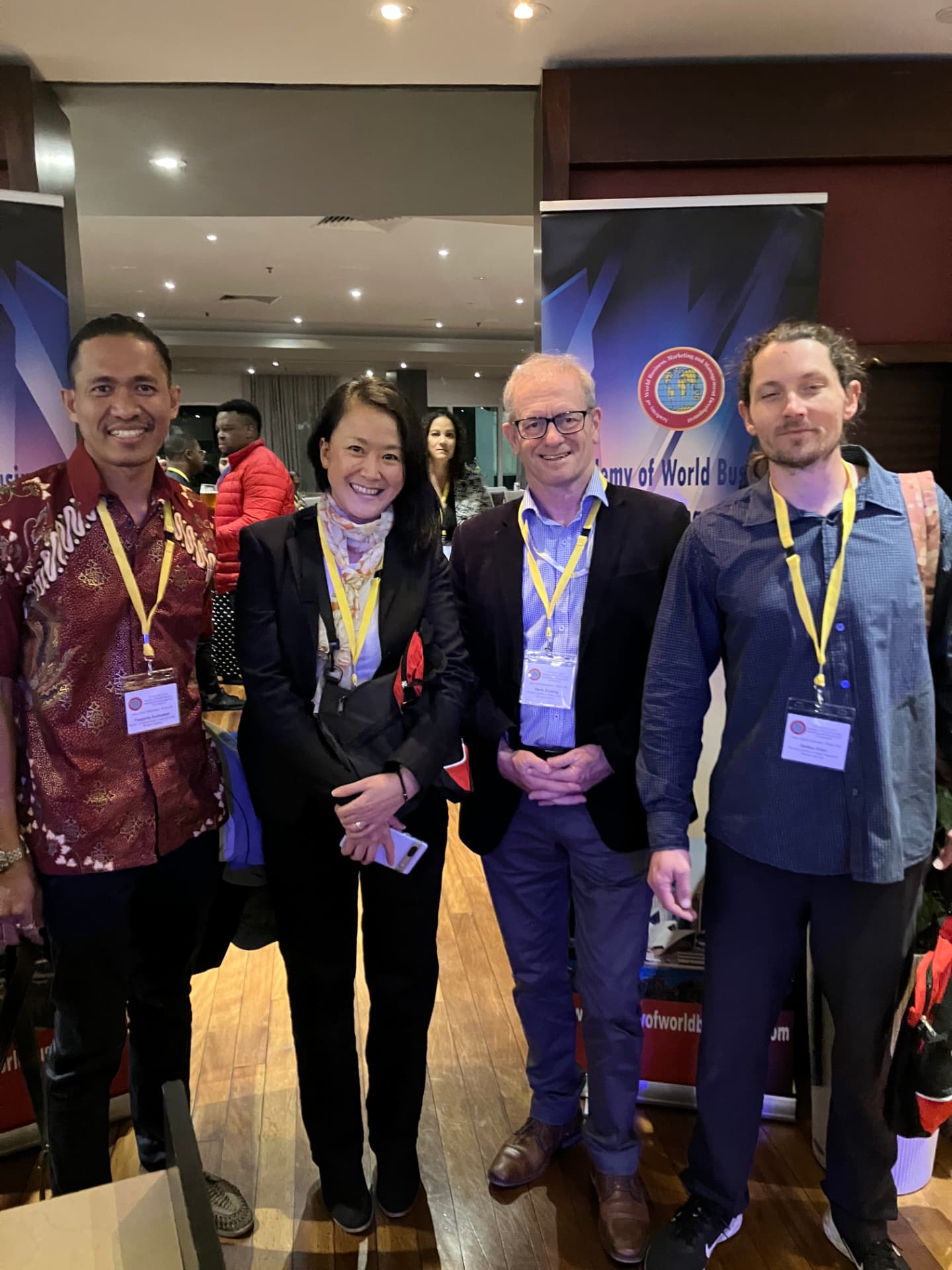 Delegates in front of AWBMAMD banners at the 2023 Perth conference