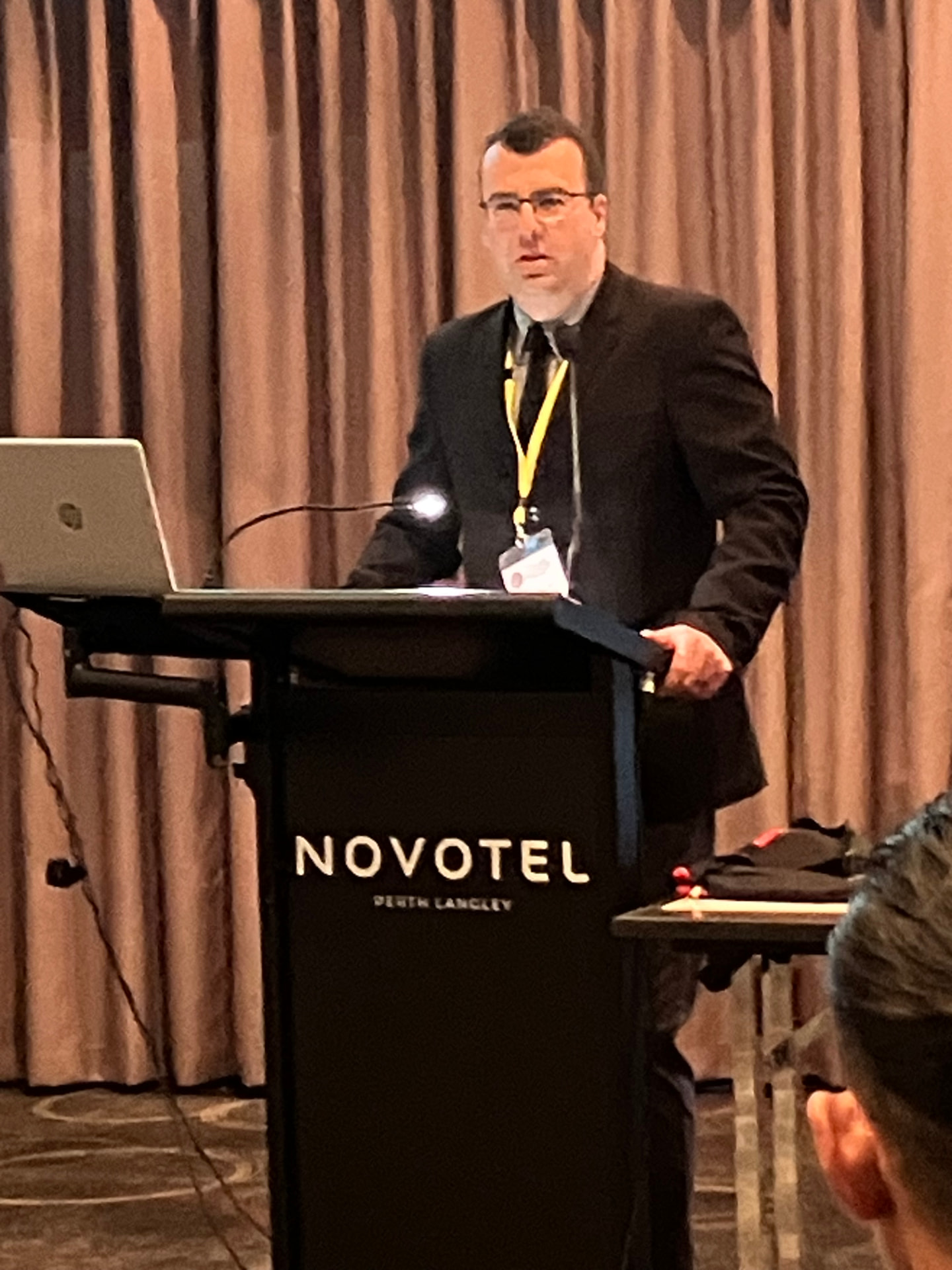 A delegate presenting a paper at the Novotel Perth Langley, AWBMAMD 2023
